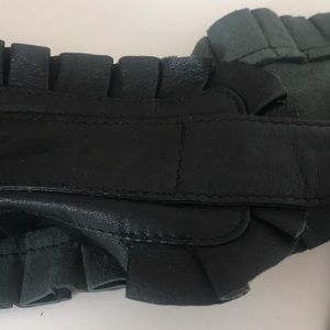 Black leather cinch belt with ruffle detail